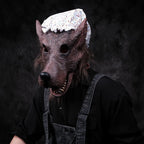 Granny Wolf Costume Mask close-up with pointed ears, floral cap and dark overalls