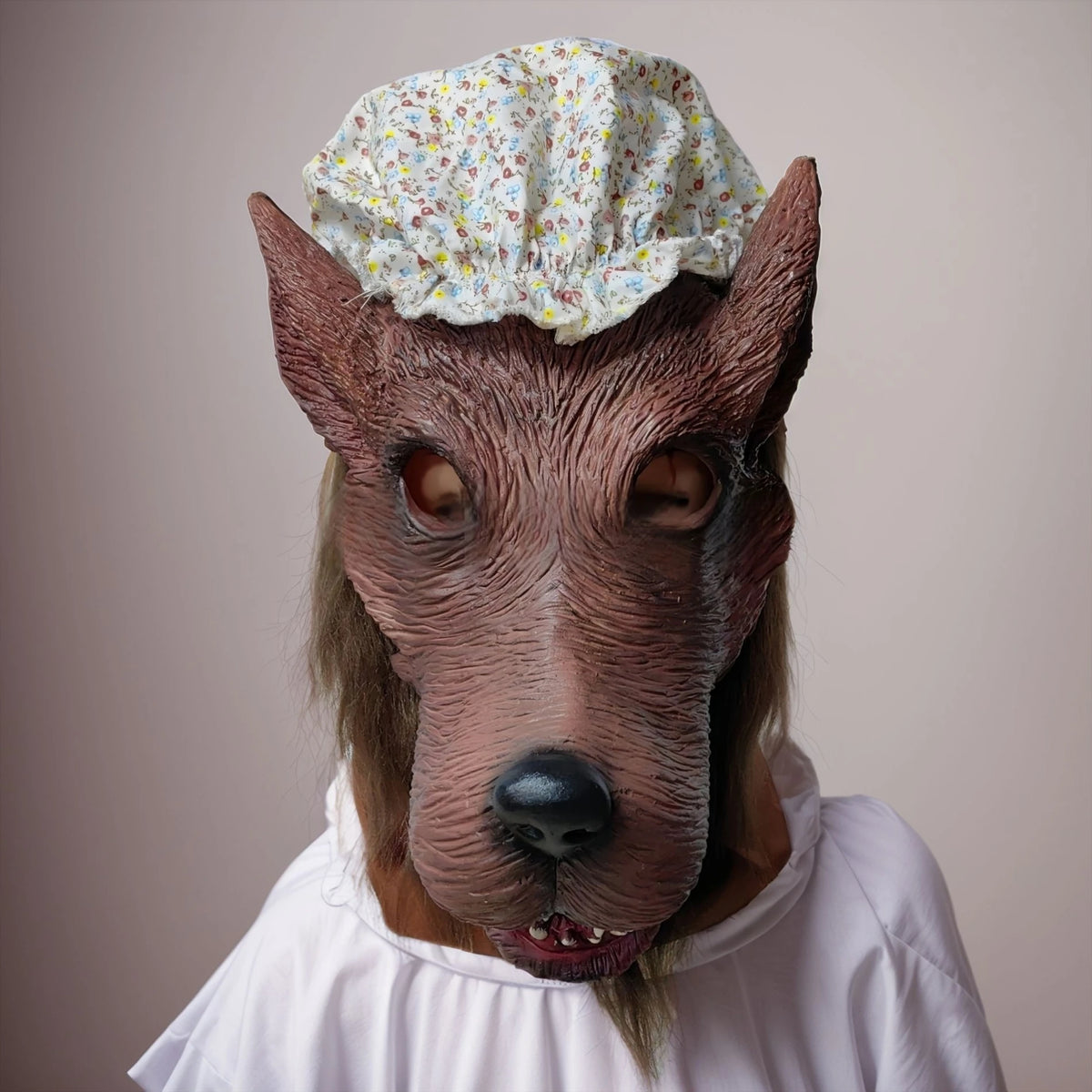 Granny Wolf Costume Mask frontal detail with floral cap, open eye areas and dark nose