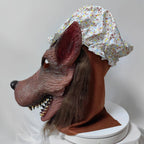 Granny Wolf Costume Mask left-side close-up of the pointed ear, floral cap and shaggy hair