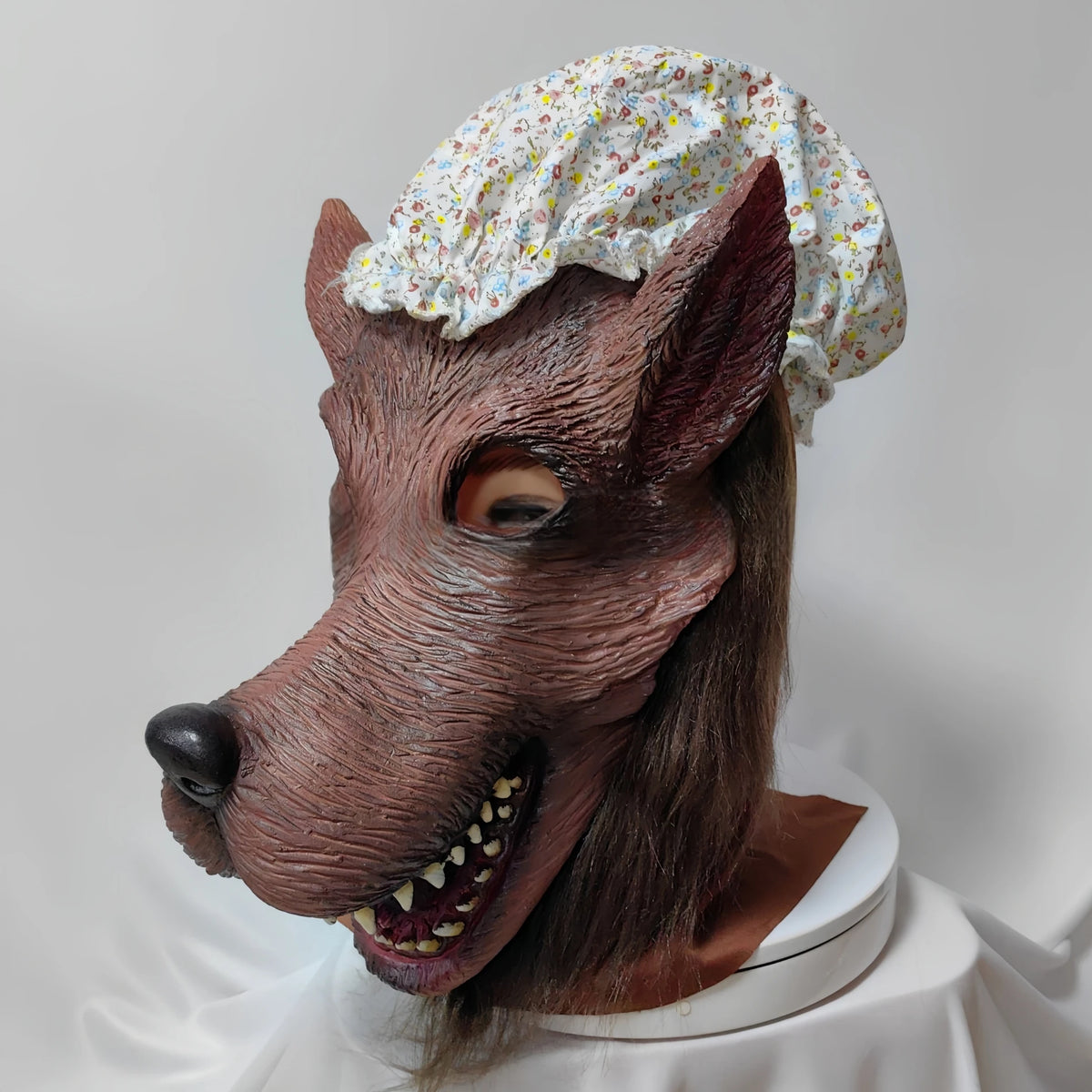Granny Wolf Costume Mask close-up showing sculpted fur, eye opening, long snout and teeth