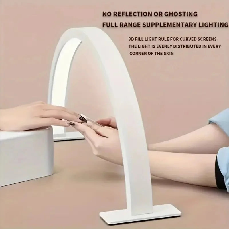 Half Moon Nail Lamp white side view showing a nail technician working beneath the illuminated arch.
