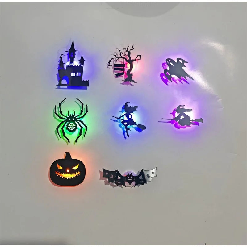 Halloween 3D Wall Lights eight-piece sample layout on a pale wall, showing green, purple and orange glows.