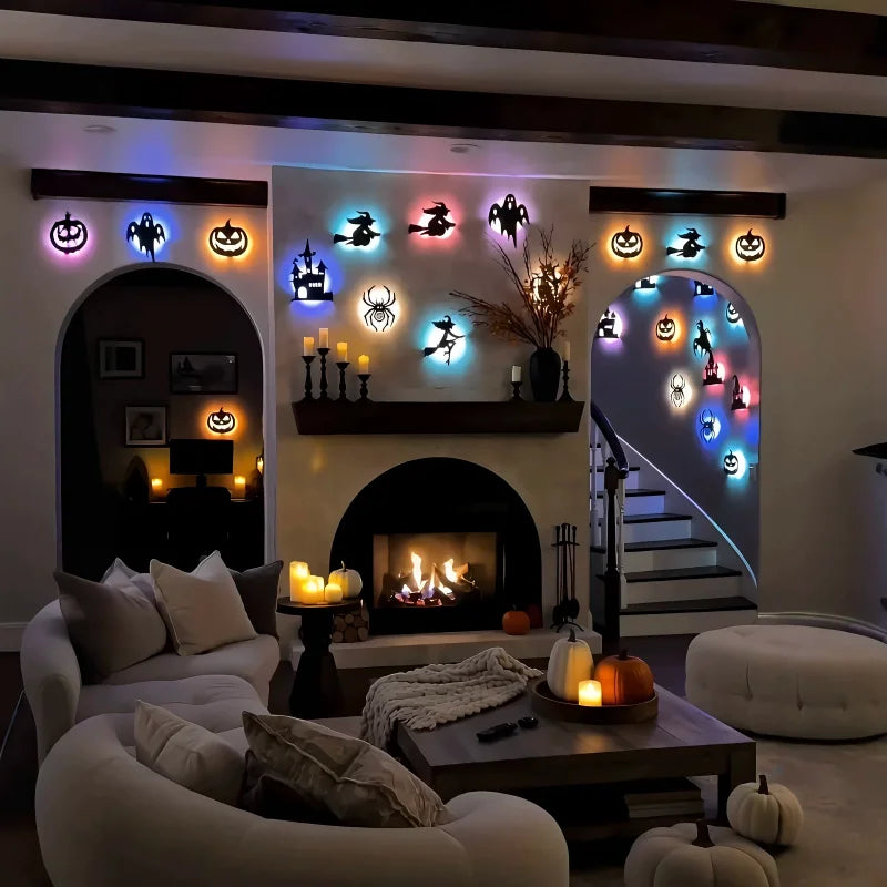 Halloween 3D Wall Lights arranged above a fireplace and around archways in a cozy decorated living room.