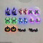 Halloween 3D Wall Lights shown in a sixteen-piece arrangement with two examples of each spooky silhouette.