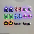 Halloween 3D Wall Lights arranged as paired designs on a pale wall, with glowing pumpkins along the bottom.