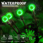 Green Halloween eyeball stake lights shown in rain with outdoor weather protection graphics