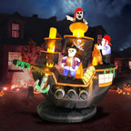 Glowing 7FT Halloween pirate ship inflatable with skeleton crew displayed in a front yard at night
