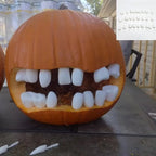 Halloween Pumpkin Teeth Inserts, round style creating a crooked grin with an assortment inset