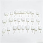 Halloween Pumpkin Teeth Inserts round set laid out in three rows with pointed mounting stems