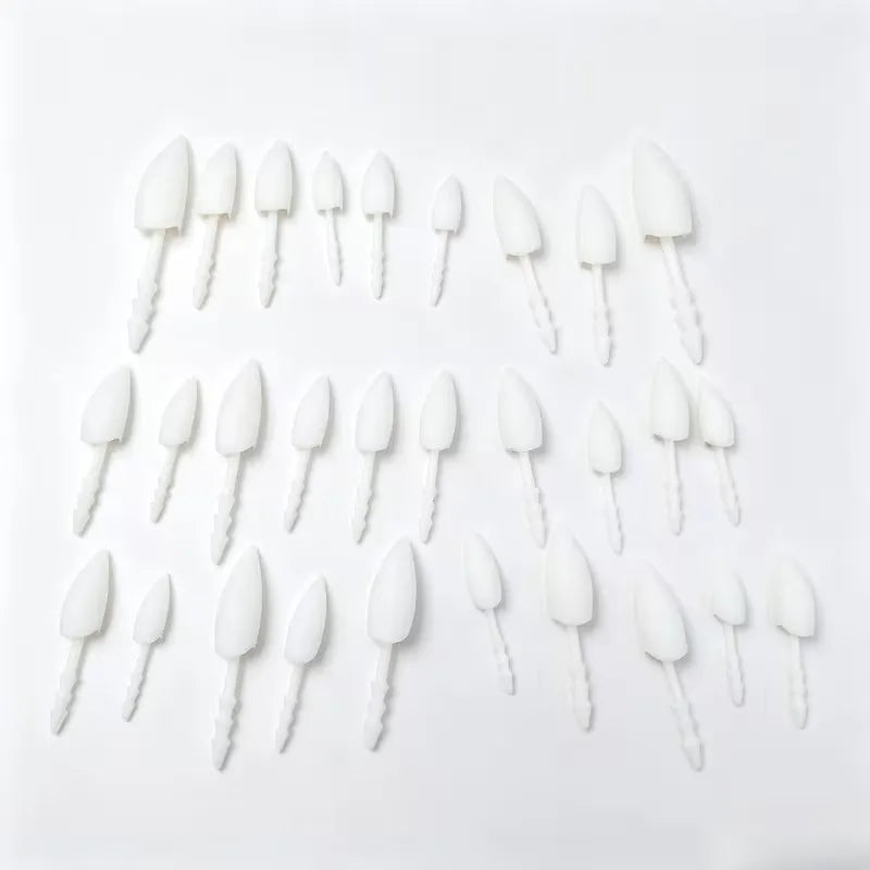 Halloween Pumpkin Teeth Inserts sharp assortment displaying long fangs and smaller pointed teeth