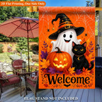 Halloween Welcome Garden Flag with orange ghost and black cat artwork on an outdoor patio