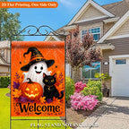 Halloween Welcome Garden Flag beside a sunny house walkway with black cat and pumpkin design