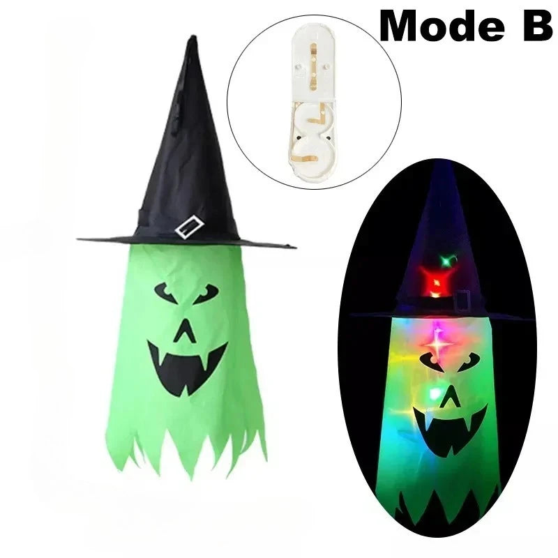 Halloween Witch Hat Lanterns in green, shown unlit and glowing with a grinning character face