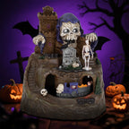 Haunted Halloween Train Village at HighPeak shown unlit from the front with purple train and pumpkin display props.