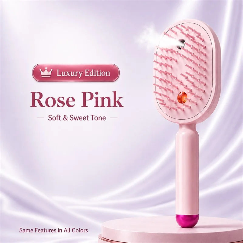 Heatless Straightening Brush in pink shown upright with fine mist spraying from the brush head