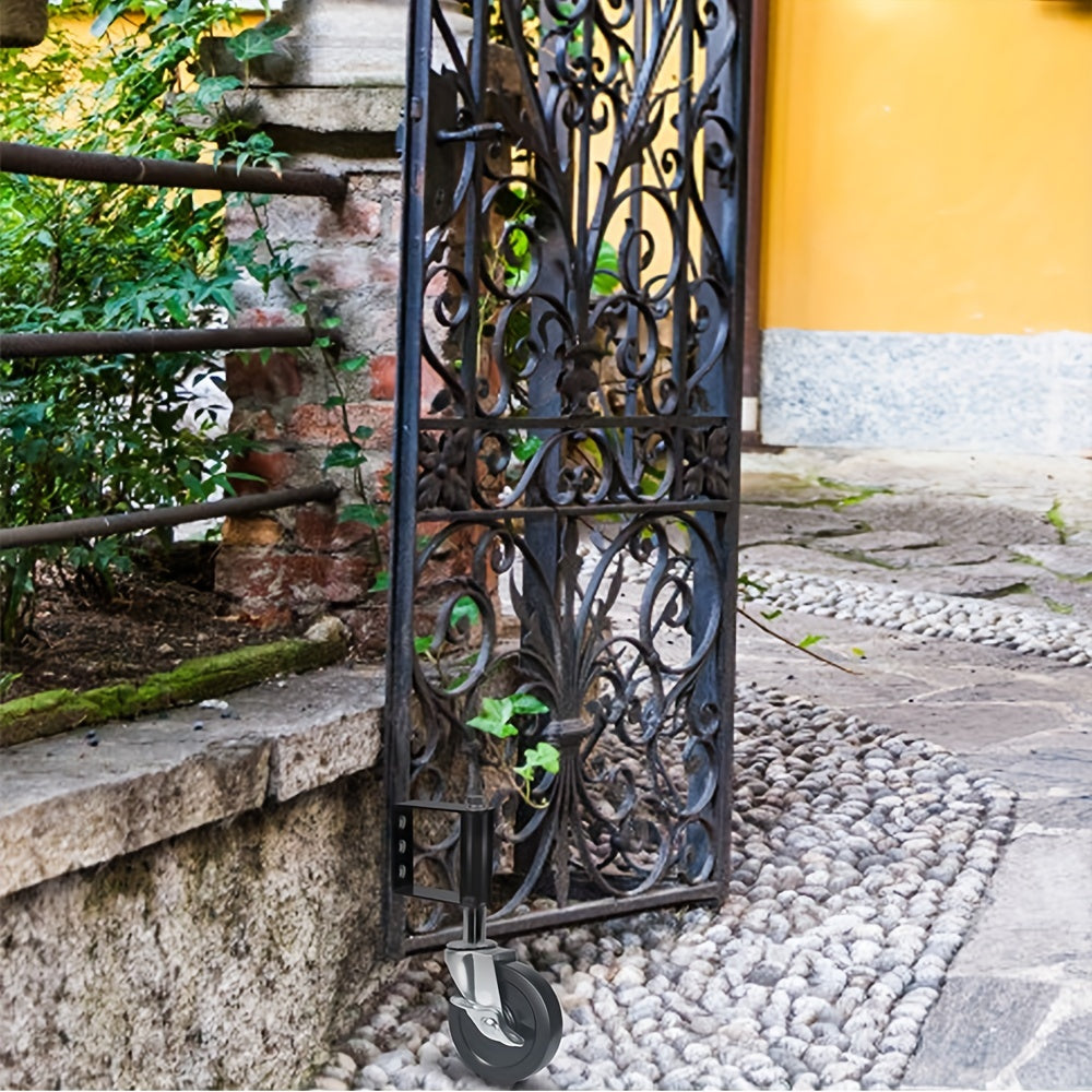 Heavy Duty Gate Wheel black model supporting a wrought iron garden gate