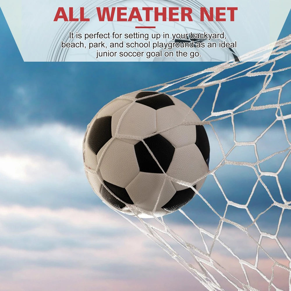 Backyard Soccer Goal with black and white ball hitting weatherproof white net against blue sky by HighPeak