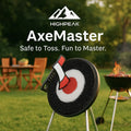 HighPeak AxeMaster™ target game with foam axe stuck in bullseye on tripod stand in a backyard setting