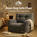 HighPeak Bean Bag Sofa Chair in charcoal sherpa upholstery with ergonomic tufted design in cozy bedroom setting