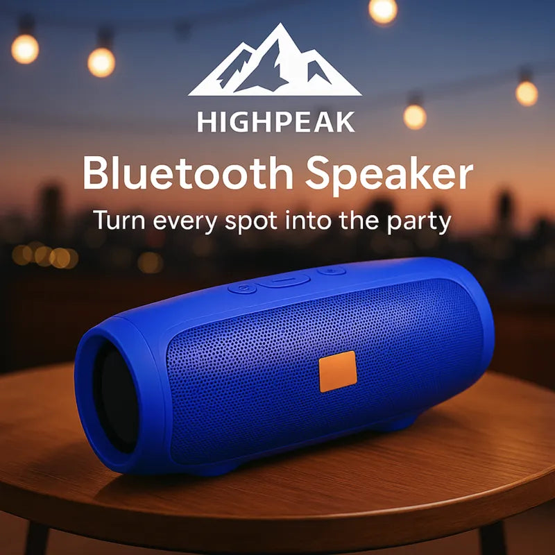 HighPeak Bluetooth Speaker in blue on a wooden table with city lights, portable and ready for outdoor party use