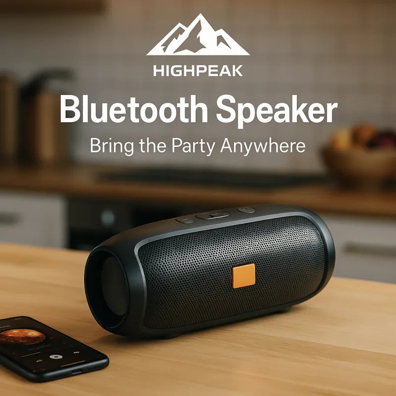 HighPeak Bluetooth Speaker in black on a wooden table paired with smartphone, showcasing portable wireless sound for indoor use