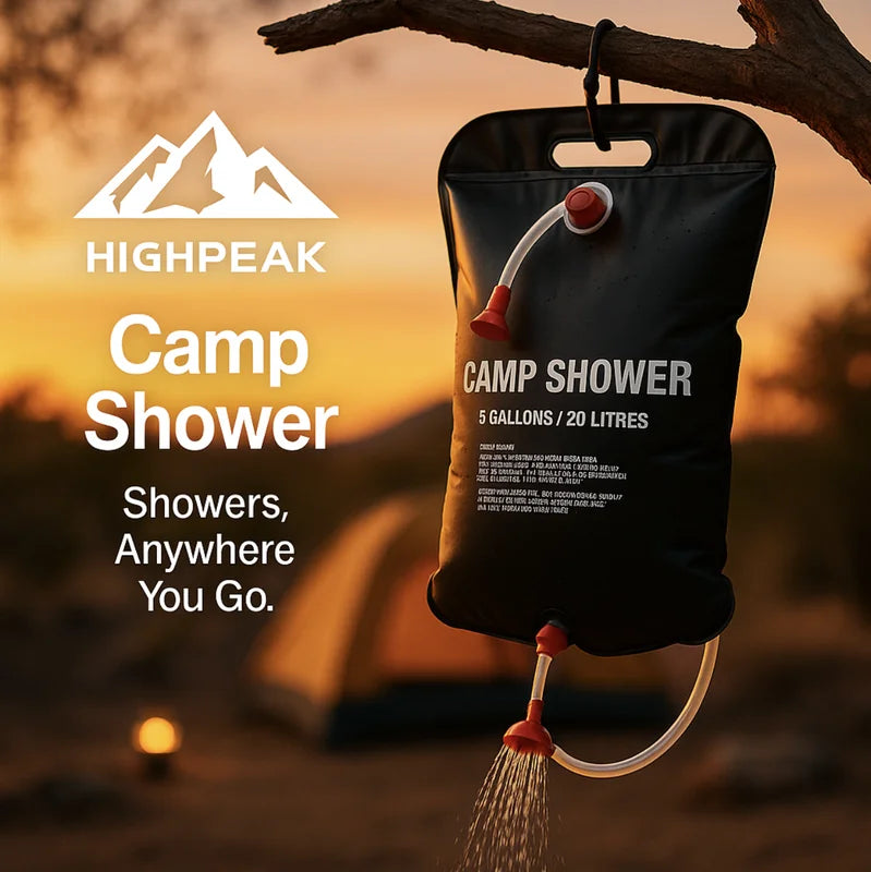 HighPeak Camp Shower black bag hanging from tree branch outdoors with water flowing at sunset campsite