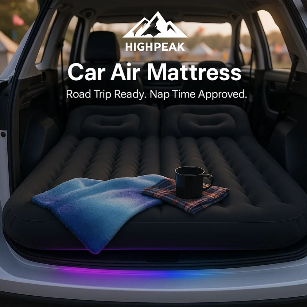 HighPeak Car Air Mattress with Pump inflated in black inside SUV trunk with blanket and mug for road trip comfort