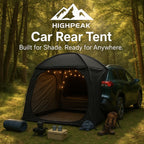 HighPeak Car Rear Tent in black attached to green SUV in forest with camping gear and LED lights inside at dusk