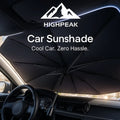 HighPeak Car Sunshade umbrella-style black sunshade installed inside a car windshield blocking sunlight.