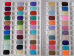 Numbered fabric color swatches for custom evening gown orders