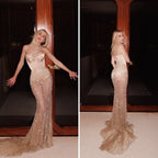 Front and back views of the gold Cascading Sparkle Evening Gown with a fitted bodice and embellished mermaid skirt