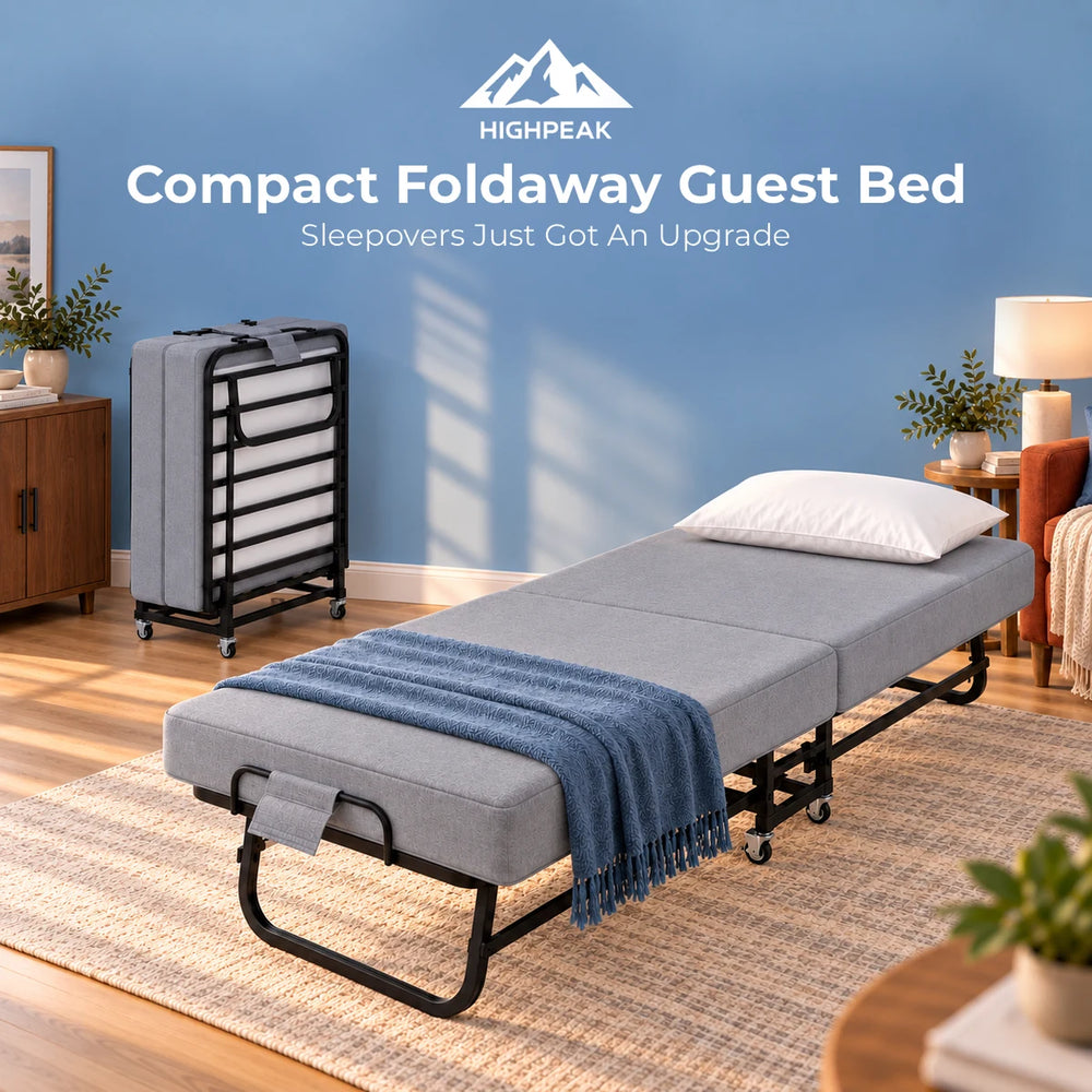 A gray compact foldaway guest bed with a black metal frame and wheels is shown in a styled bedroom setting with a blue wall, rug, side table, lamp, and folded bed unit in the background. White text at the top reads 'HIGHPEAK Compact Foldaway Guest Bed Sleepovers Just Got An Upgrade'.