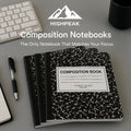HighPeak Composition Notebooks 4-Pack with classic black and white covers, 200 pages each, arranged on a desk with pen and keyboard.