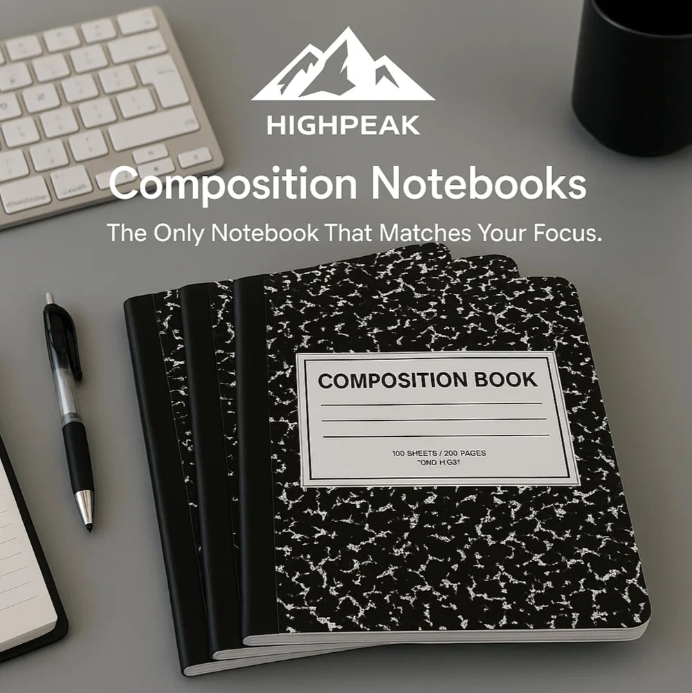 HighPeak Composition Notebooks 4-pack with classic black marbled covers, 200 pages each, on a desk with pen and keyboard