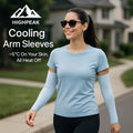 HighPeak Cooling Arm Sleeves in light blue worn by smiling woman outdoors, UV-blocking and breathable stretch fabric.