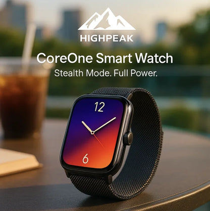 HighPeak CoreOne Smart Watch with black mesh band and vibrant AMOLED display on outdoor table at sunset