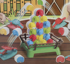 Close-up of box artwork showing sheep launched into a fenced pen