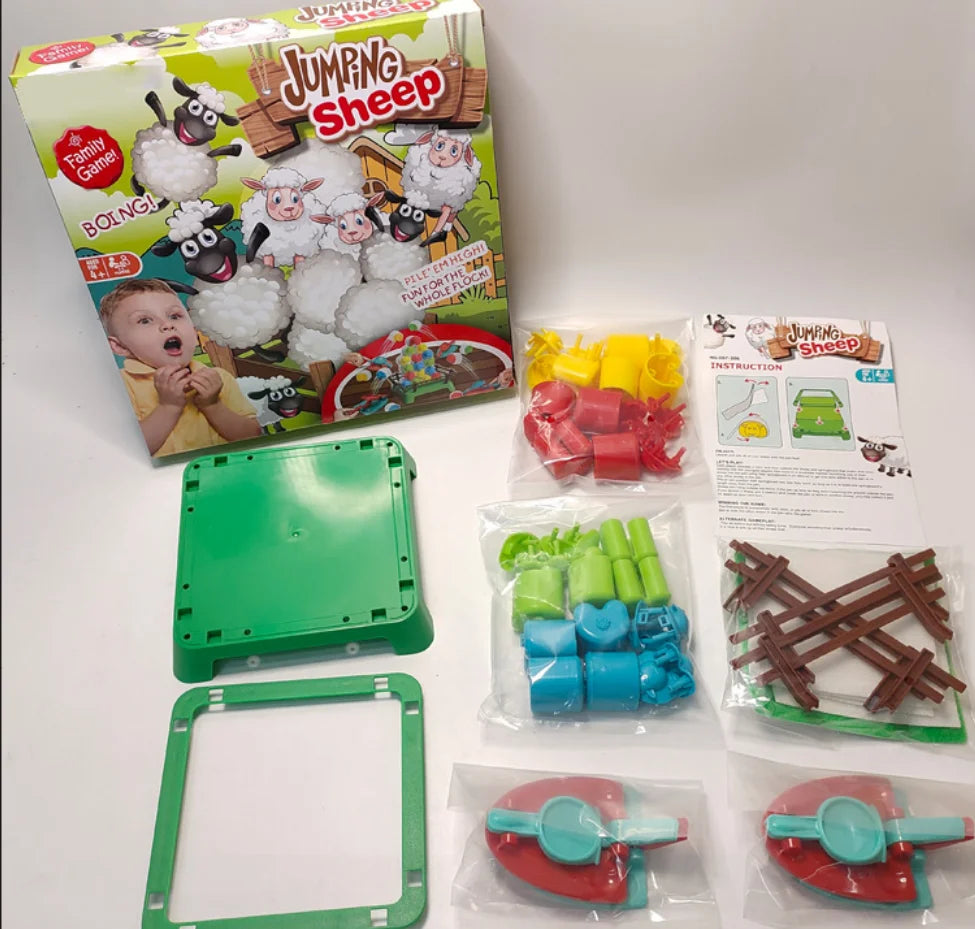 Unassembled sheep game with pen parts, bagged pieces, launchers, instructions and box