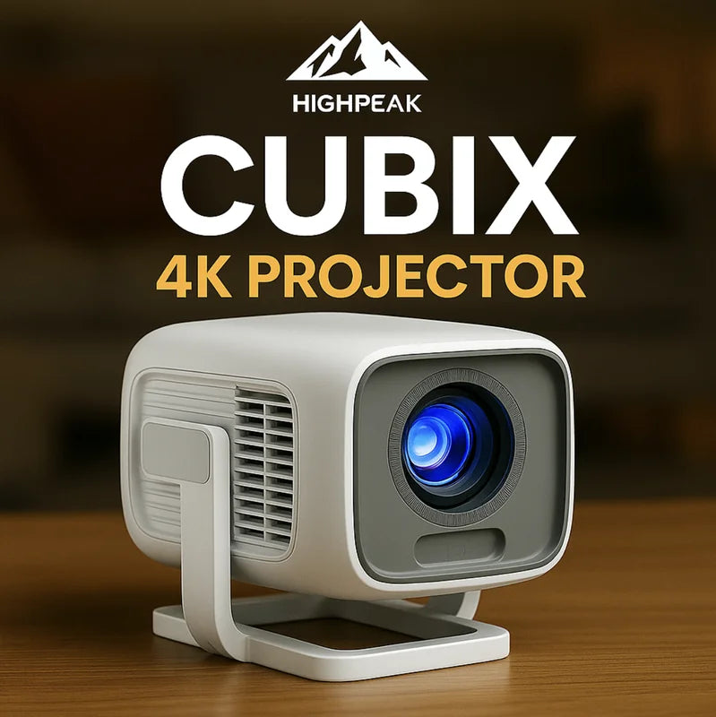 HighPeak CUBIX 4K projector in white compact cube design with blue lens display on wooden surface