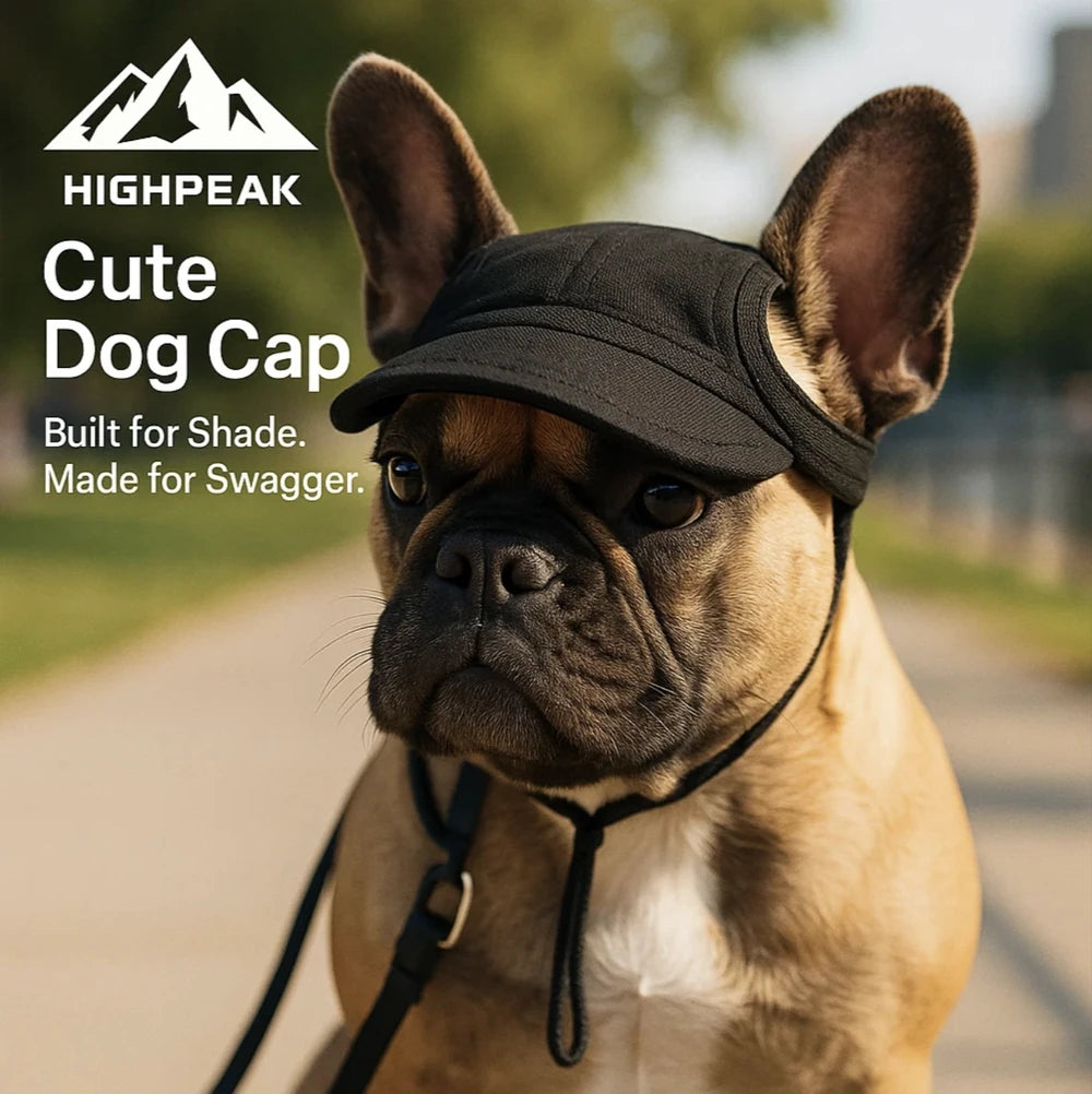 HighPeak Cute Dog Cap in black on a French Bulldog outdoors, breathable with ear holes and adjustable straps for shade.