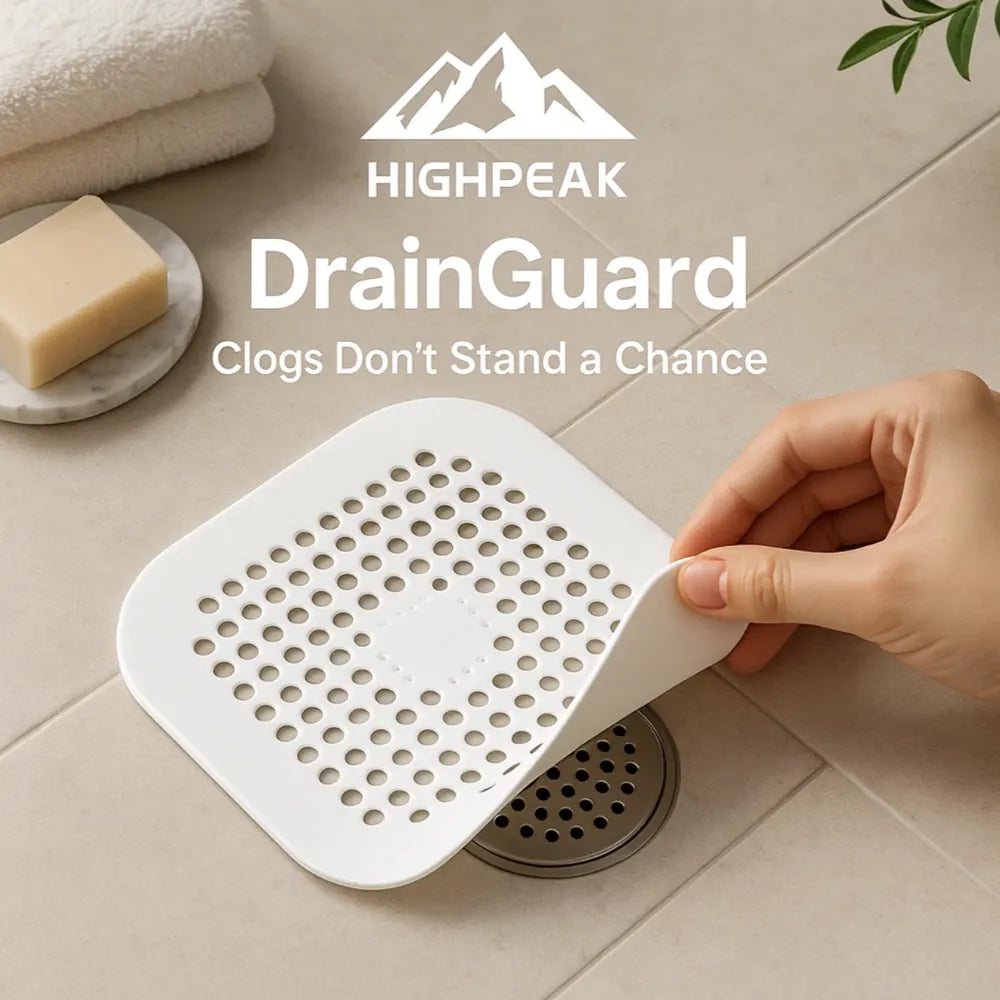 HighPeak DrainGuard™ white silicone drain protector being placed over a bathroom floor drain to prevent clogs and debris buildup