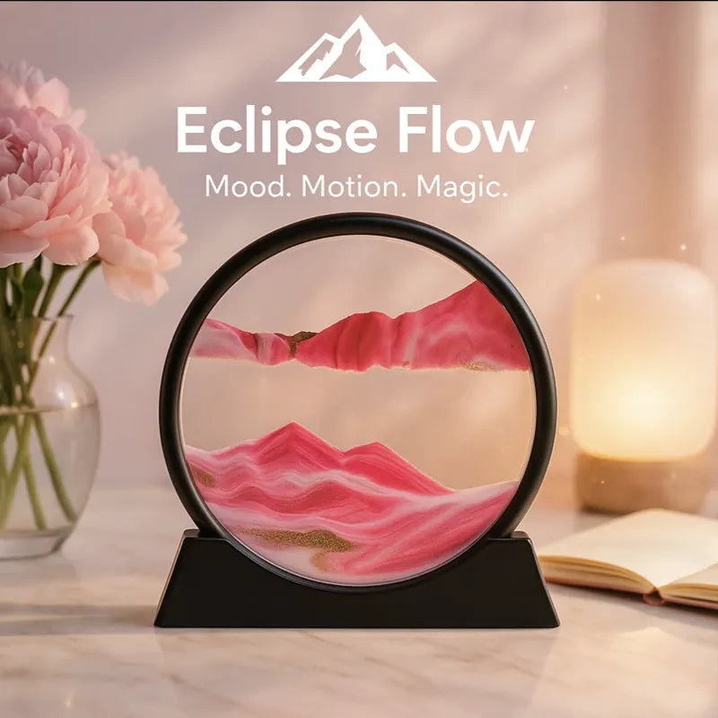 Eclipse Flow™ Dynamic Sand Art in pink and gold on black base, creating calming motion on a softly lit desk by HighPeak
