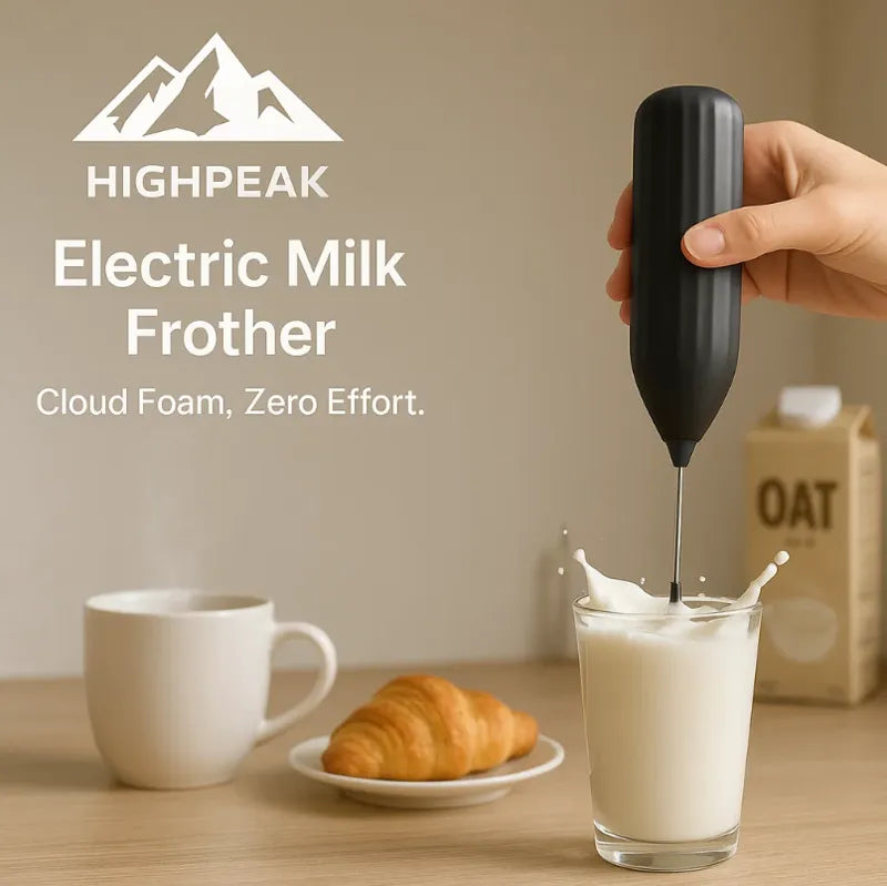 HighPeak Electric Milk Frother in black creating frothy milk in a glass with oat milk carton and breakfast scene