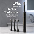 HighPeak Sonic Electric Toothbrush in black with four brush heads on a bathroom counter near a sink and mirror