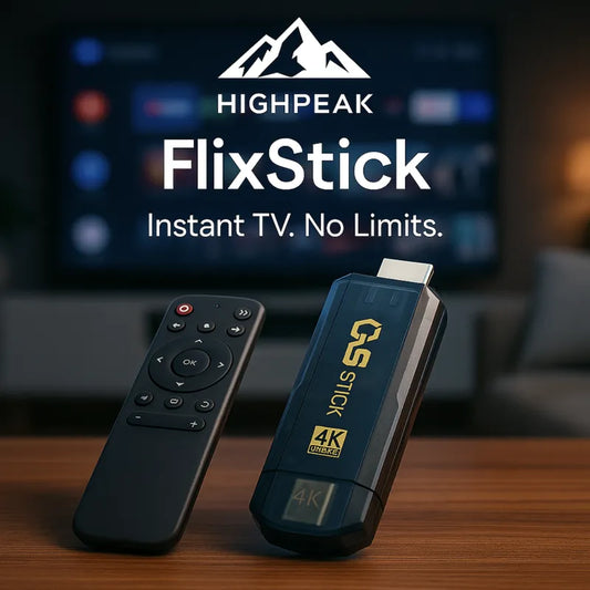 HighPeak FlixStick 4K streaming stick and black remote on wooden table with TV blurred in background