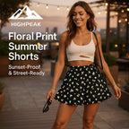HighPeak Floral Print Summer Shorts in black with white flowers worn by smiling woman at sunset outdoor setting