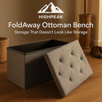 HighPeak FoldAway Ottoman Bench in gray with tufted padded seat and hidden storage on wood floor next to shoes and basket