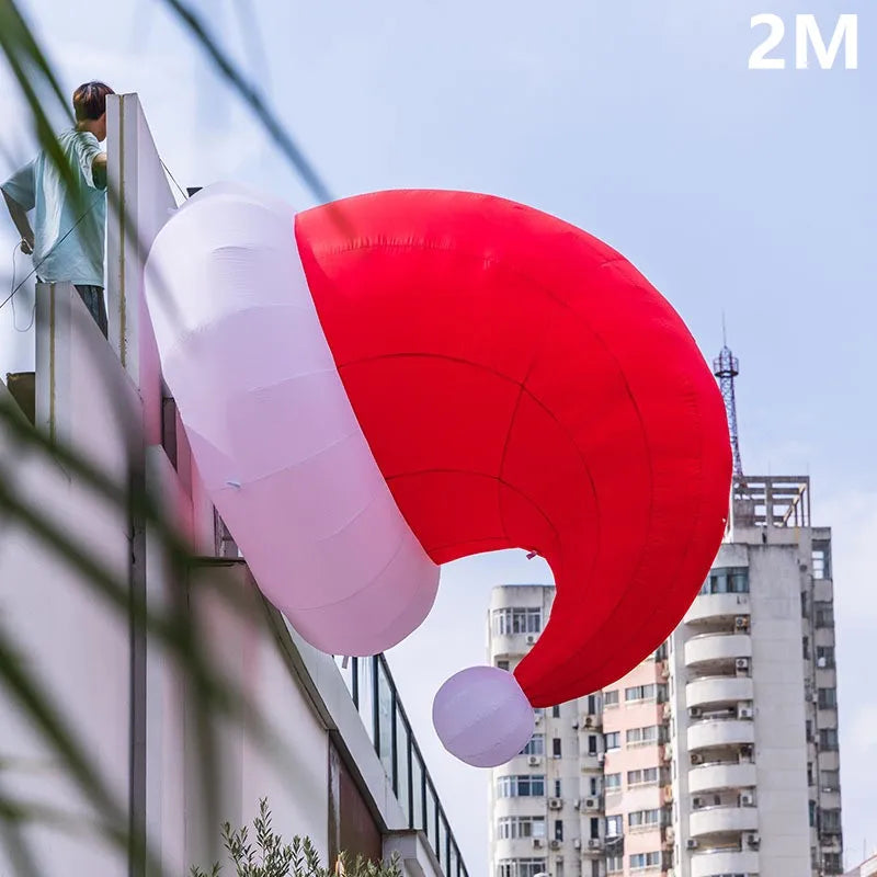 6.6FT (2M) Giant Inflatable Santa Hat mounted beside a building