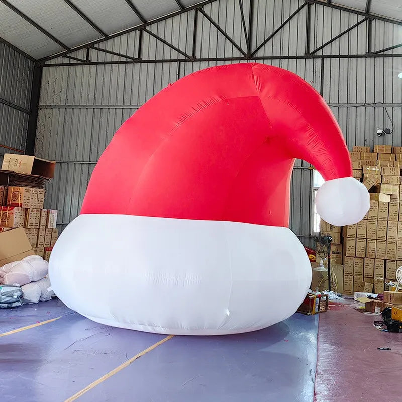 Giant Inflatable Santa Hat fully inflated in a warehouse