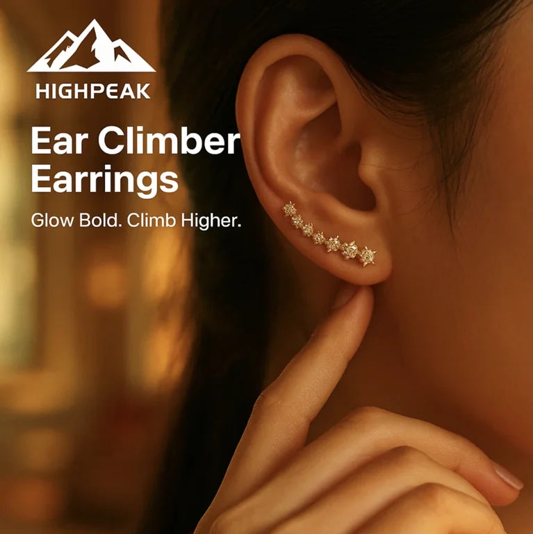 HighPeak Ear Climber Earrings in gold with sparkling rhinestones worn on ear, elegant and modern design close-up